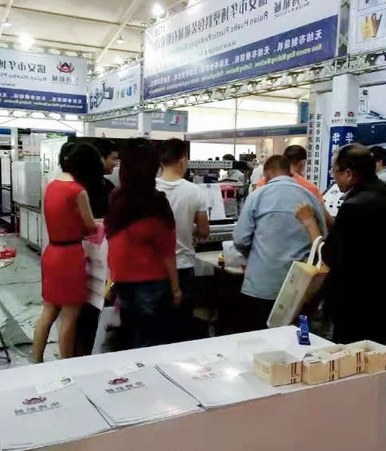 Exposición de Yiwu de la empresa de máquinas de sellado de bucle de mango de alta calidad